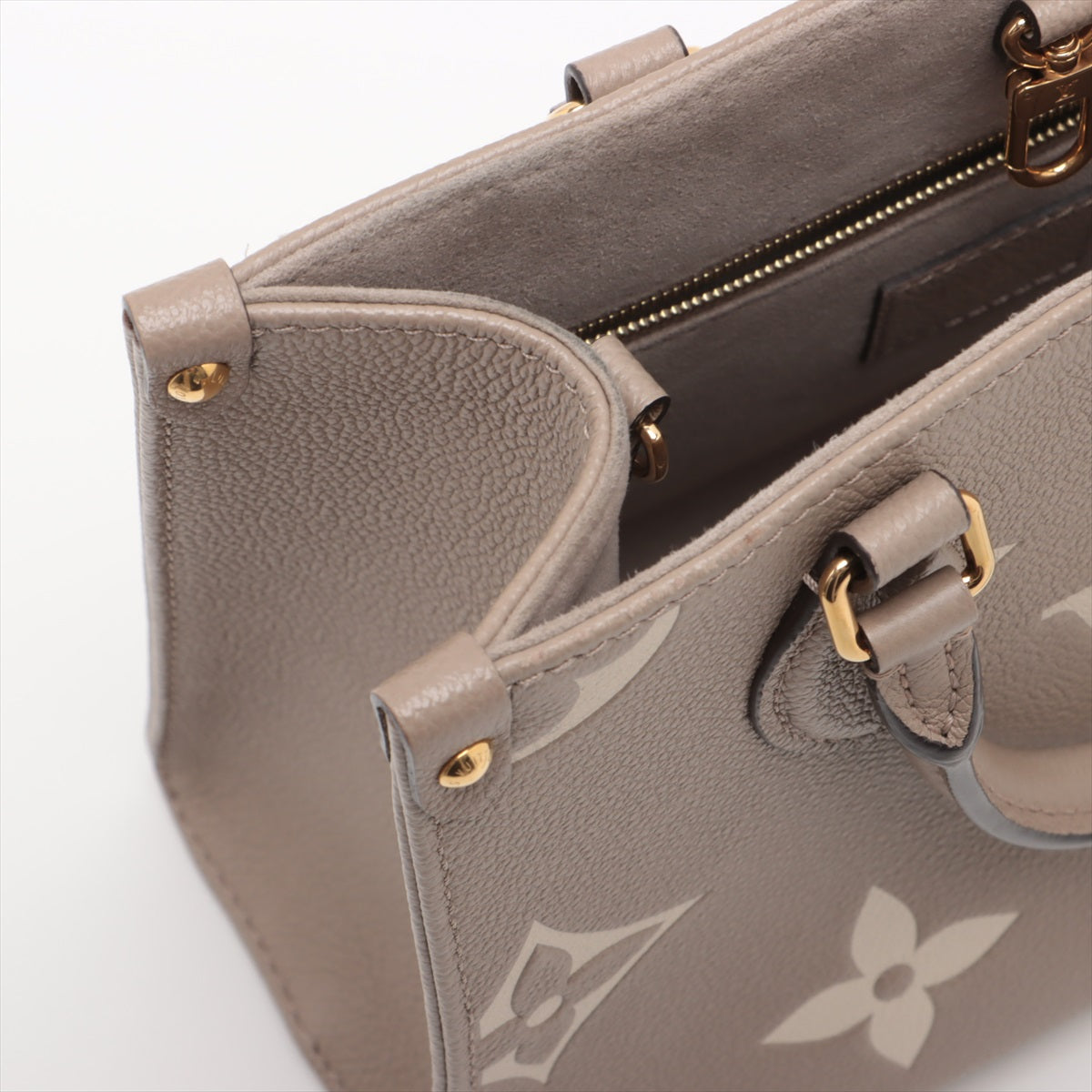 Louis Vuitton bicolor monogram empreinte On the Go PM M45779