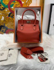 Hermès rouge leather toolbox top handle bag palladium hardware with shoulder strap and lock set