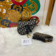 Christian Dior navy oblique saddle with guitar strap