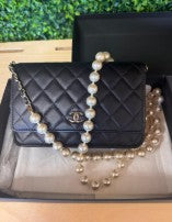 Chanel WOC Black Lambskin with Pearl Strap