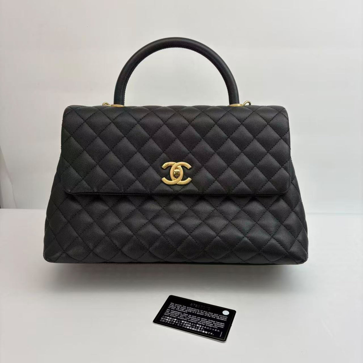Chanel Black Caviar Maxi Coco Handle, Seal, Series 27