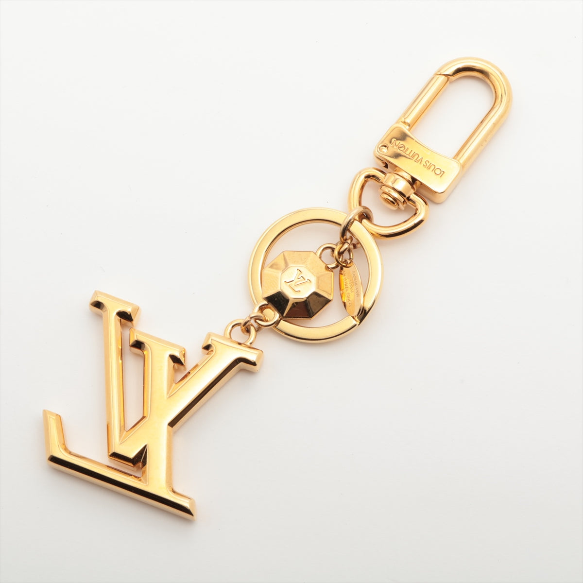 Louis Vuitton Porto Cure LV facet Keyring GP Gold