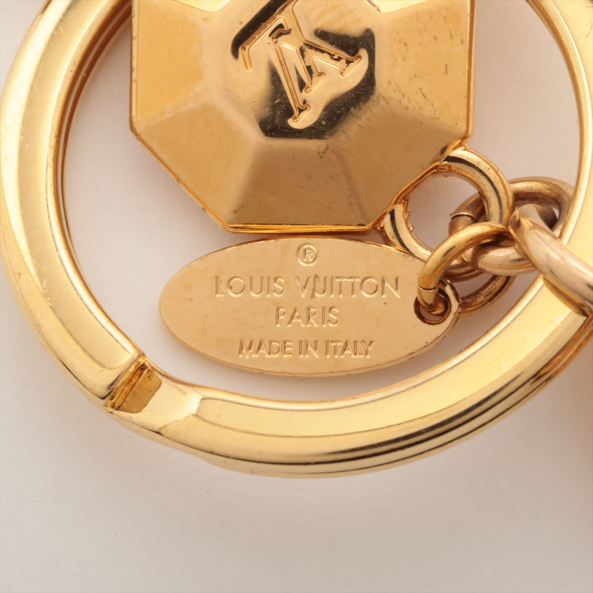 Louis Vuitton Porto Cure LV facet Keyring GP Gold
