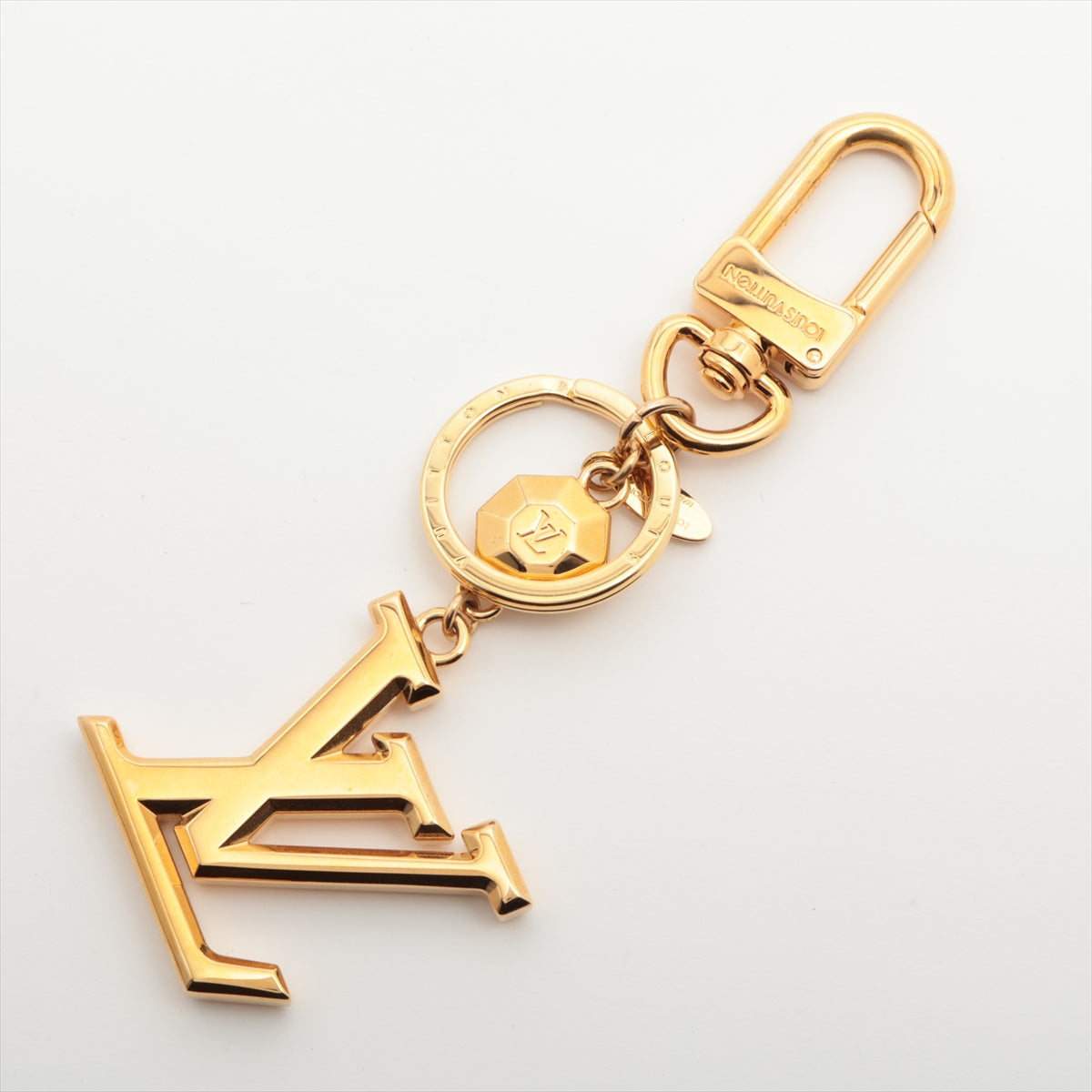 Louis Vuitton Porto Cure LV facet Keyring GP Gold