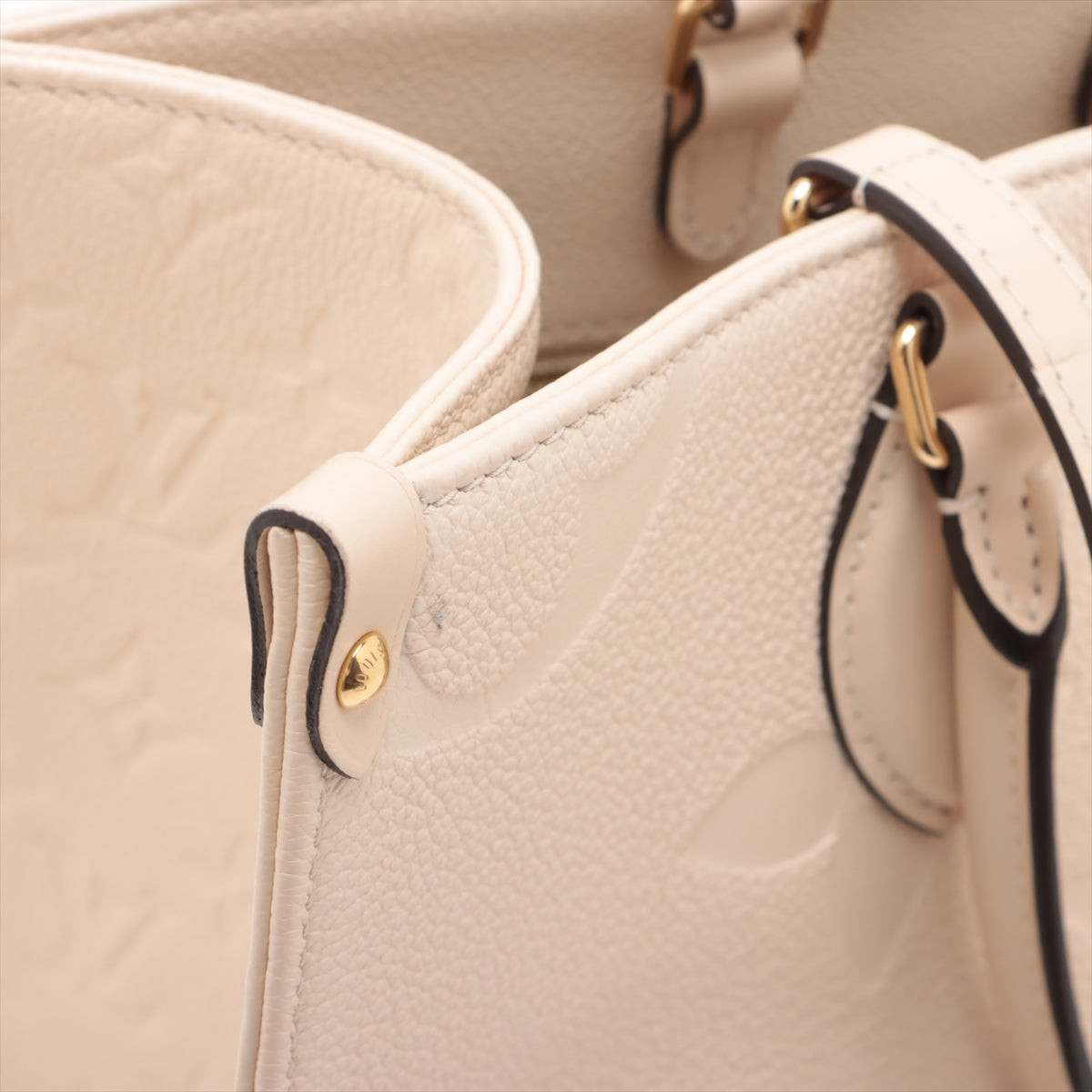 Louis Vuitton monogram empreinte On the Go MM M46531