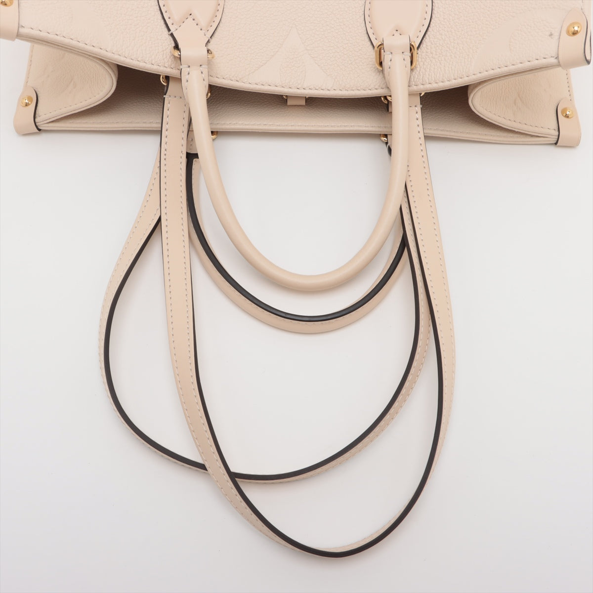 Louis Vuitton monogram empreinte On the Go MM M46531