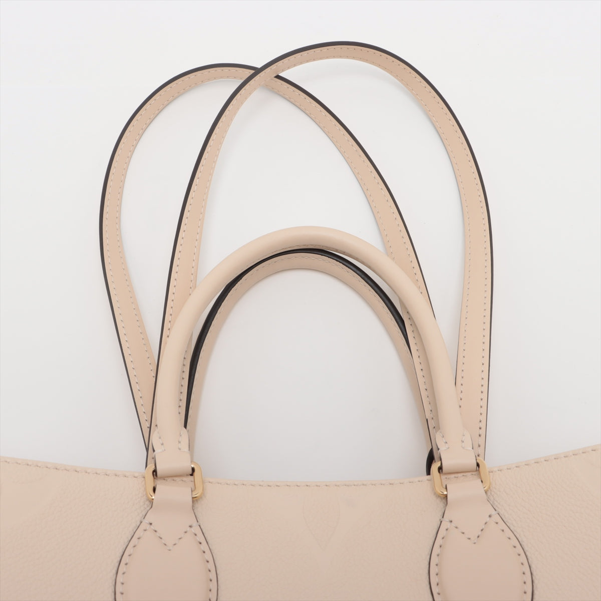 Louis Vuitton monogram empreinte On the Go MM M46531