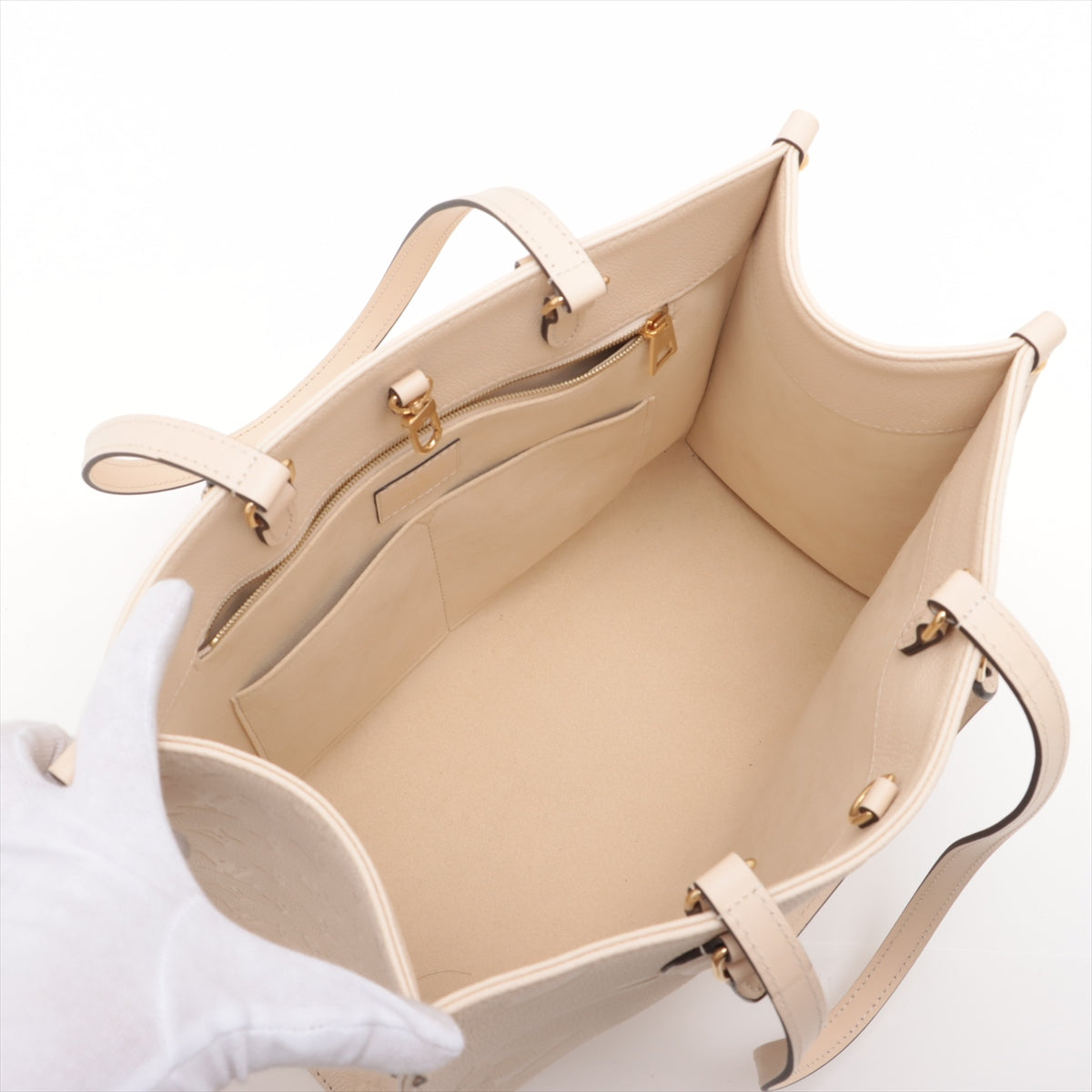 Louis Vuitton monogram empreinte On the Go MM M46531