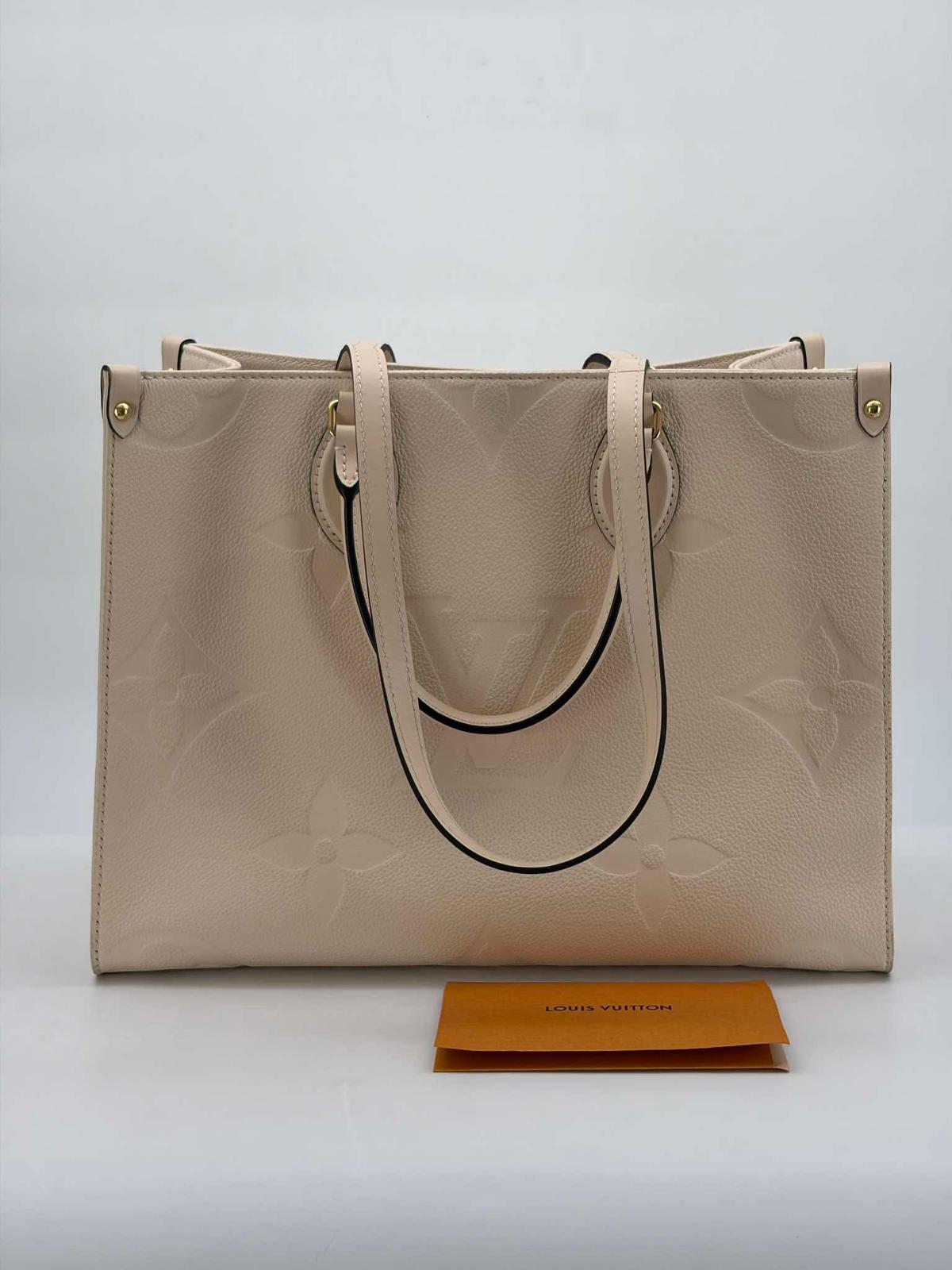Louis Vuitton Ivory Empreinte OnTheGo MM