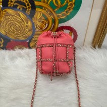CHANEL pink leather drawstring bucket bag