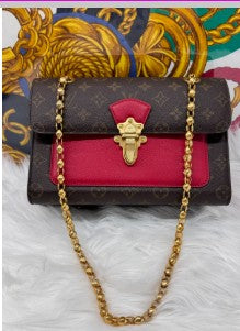 LOUIS VUITTON monogram red leather victorie gold hardware