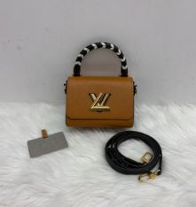 Louis Vuitton brown small size epi twist GHW with top handle and strap - SKU: LSCJ080472