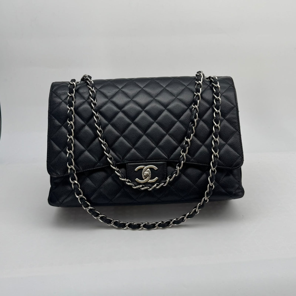 Chanel Black Caviar Maxi Double Flap, Series 18, Year 2013–2014