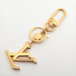 Louis Vuitton Porto Cure LV facet Keyring GP Gold