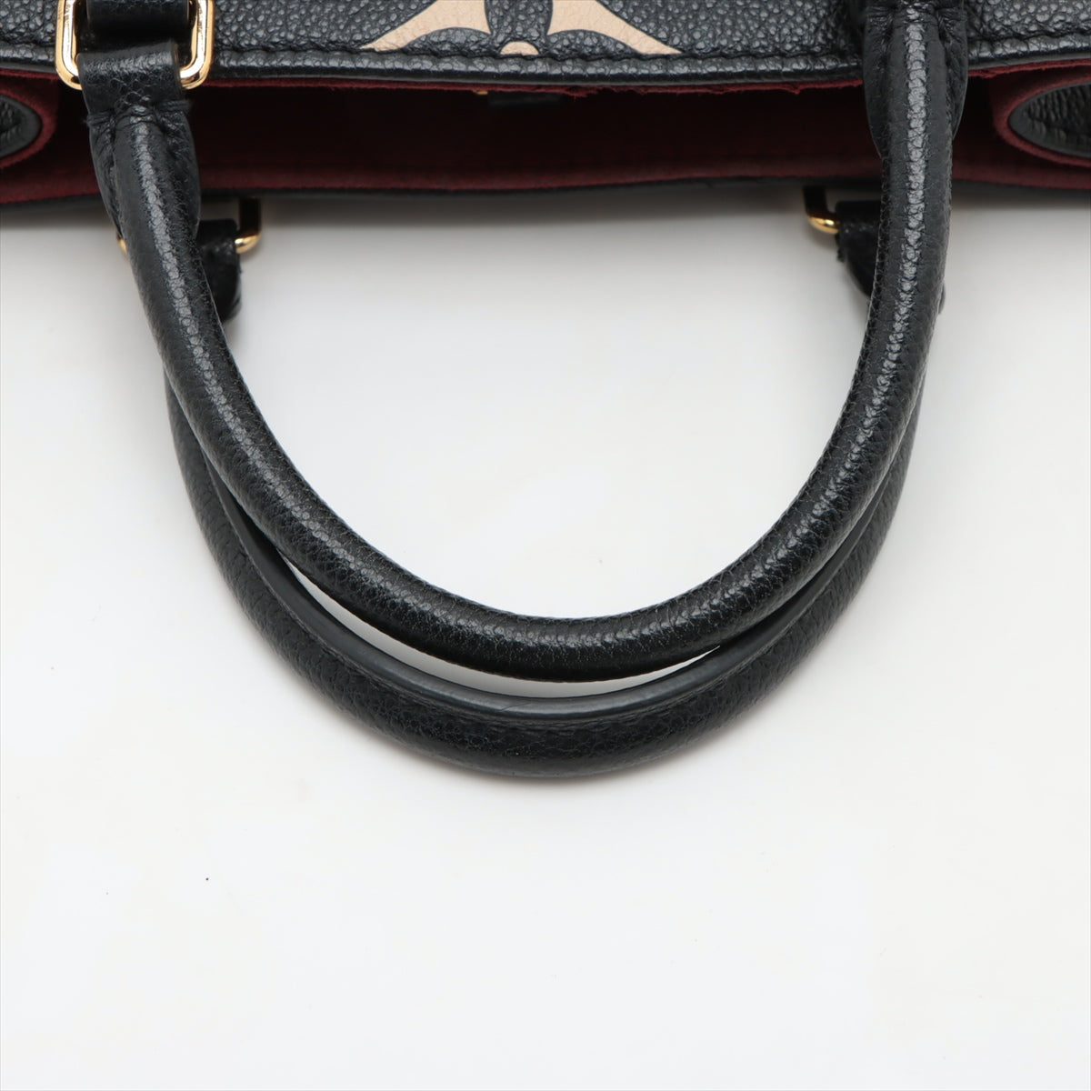 Louis Vuitton bicolor monogram empreinte On the Go PM M45659