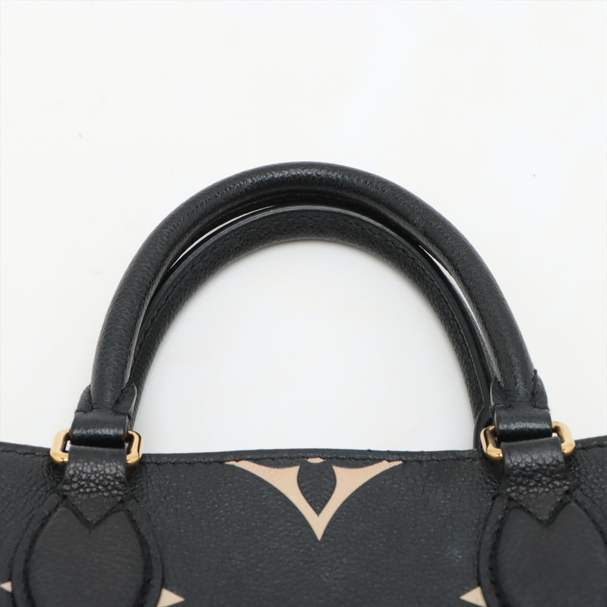 Louis Vuitton bicolor monogram empreinte On the Go PM M45659